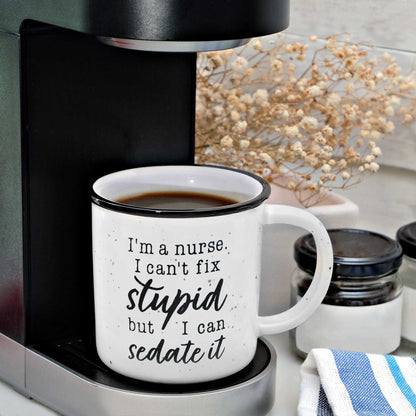 I'm A Nurse I Can't Fix Stupid But I Can Sedate It Coffee Mug